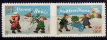 2001 - France 3439/3440 - Enfants transportant du houx et un paquet cadeau dans une brouette. (Les 2 timbres adhésifs émis en ca